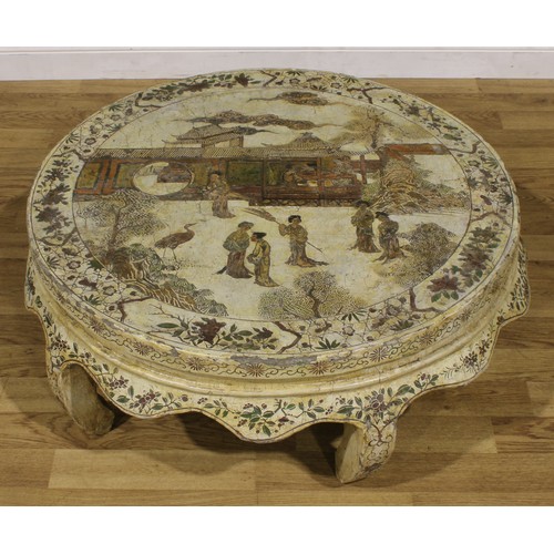 1224 - A Chinese export low table, circular top decorated with figures in a pagoda landscape on an off-whit... 