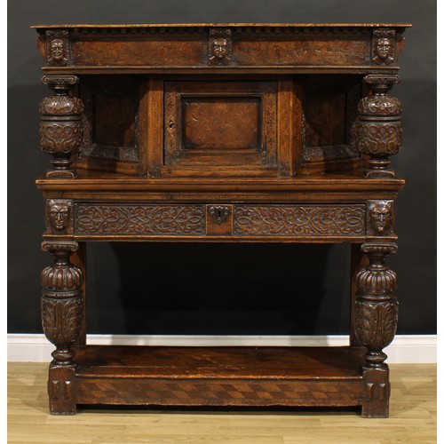 1313 - A 17th century style oak and marquetry duodarn, rectangular top with dentil capital and a frieze inl... 