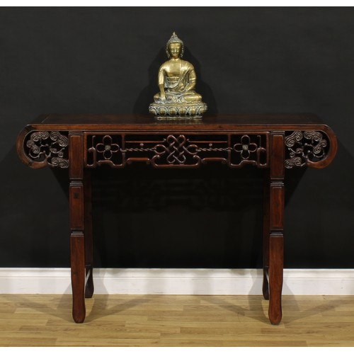 1226 - A Chinese hardwood altar table, rectangular top with scroll ends carved with branches terminating in... 