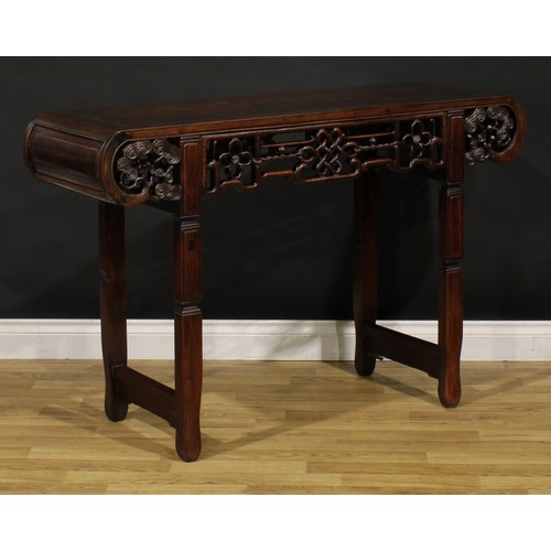 1226 - A Chinese hardwood altar table, rectangular top with scroll ends carved with branches terminating in... 