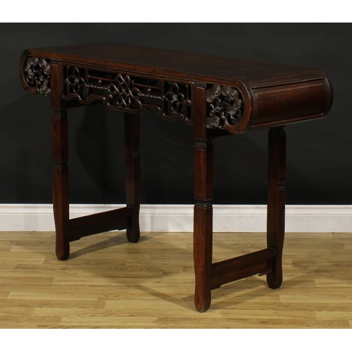 1226 - A Chinese hardwood altar table, rectangular top with scroll ends carved with branches terminating in... 