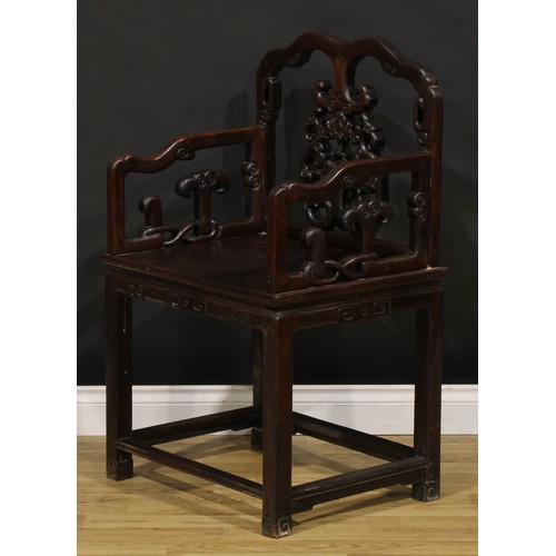 1397 - A Chinese hardwood Taishi armchair, shaped cresting rail carved with scrolls, the splat pierced and ... 