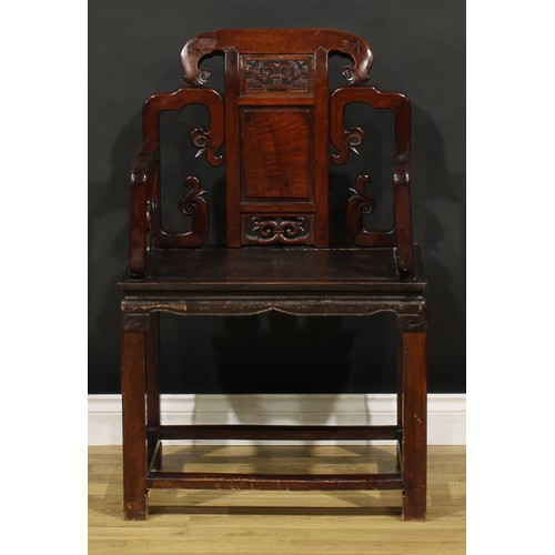 1398 - A Chinese hardwood Taishi armchair, shaped cresting rail terminating in ruyi-form ends, panel back a... 