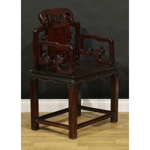 1398 - A Chinese hardwood Taishi armchair, shaped cresting rail terminating in ruyi-form ends, panel back a... 