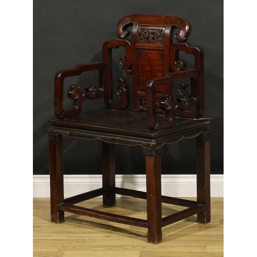 1398 - A Chinese hardwood Taishi armchair, shaped cresting rail terminating in ruyi-form ends, panel back a... 