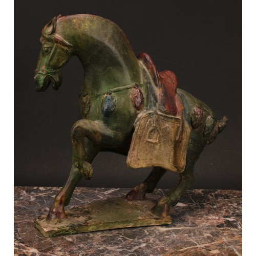 220 - A Chinese model of a horse, of Tang design, 30cm high; a Shiwan figure of an elder, 30cm high; other... 