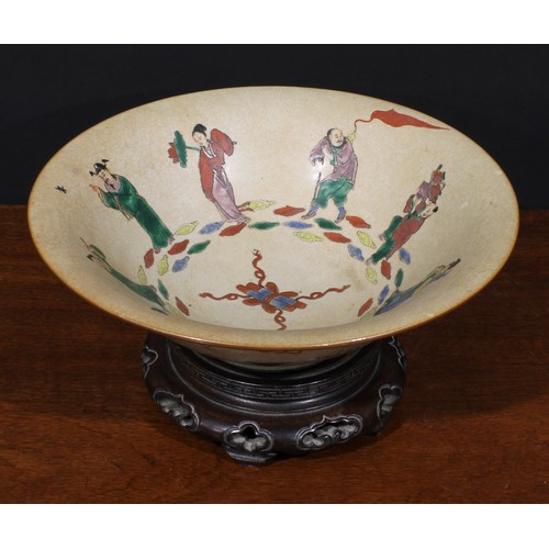 206 - A Chinese crackle glazed circular bowl, decorated in polychrome with the Eight Immortals, 28cm diame... 