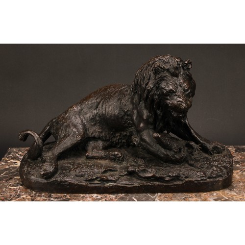 1572 - After Christophe Fratin (1801 - 1864), a brown patinated animalier bronze, lion grasping an alligato... 