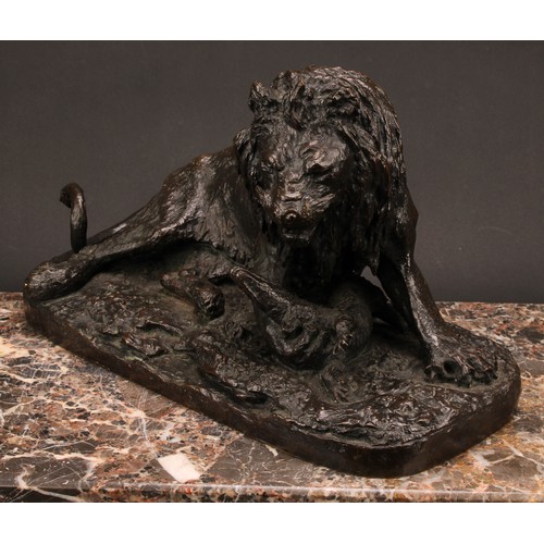 1572 - After Christophe Fratin (1801 - 1864), a brown patinated animalier bronze, lion grasping an alligato... 