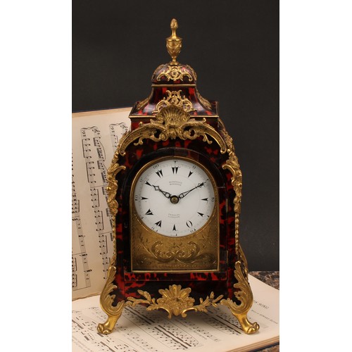 1548 - A George III gilt metal mounted tortoiseshell musical table clock, for the Turkish market, 10cm enam... 