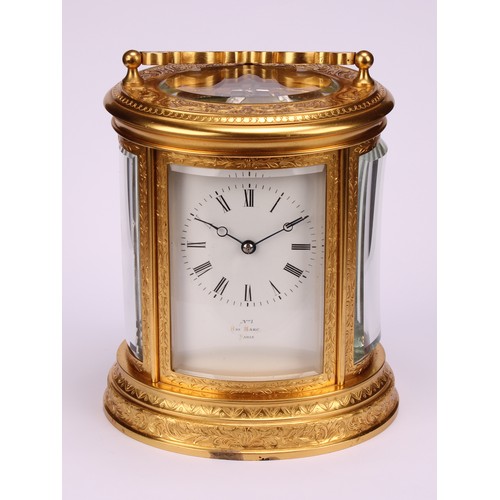 1556 - A late 19th century French gilt brass oval carriage clock, by Henry Marc, 6cm dial inscribed No1 HRY... 