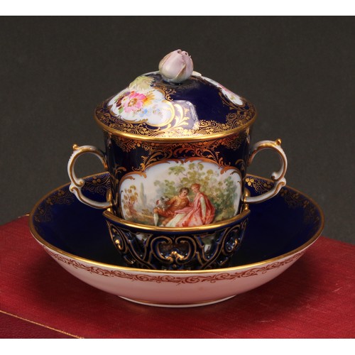 131 - A Continental porcelain trembleuse two-handled chocolate cup and cover, painted with courting couple... 