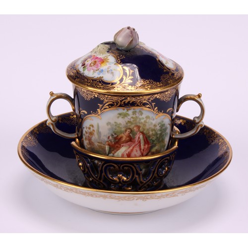 131 - A Continental porcelain trembleuse two-handled chocolate cup and cover, painted with courting couple... 