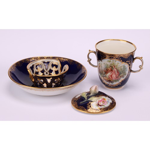 131 - A Continental porcelain trembleuse two-handled chocolate cup and cover, painted with courting couple... 