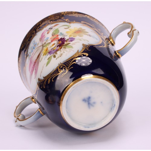 131 - A Continental porcelain trembleuse two-handled chocolate cup and cover, painted with courting couple... 