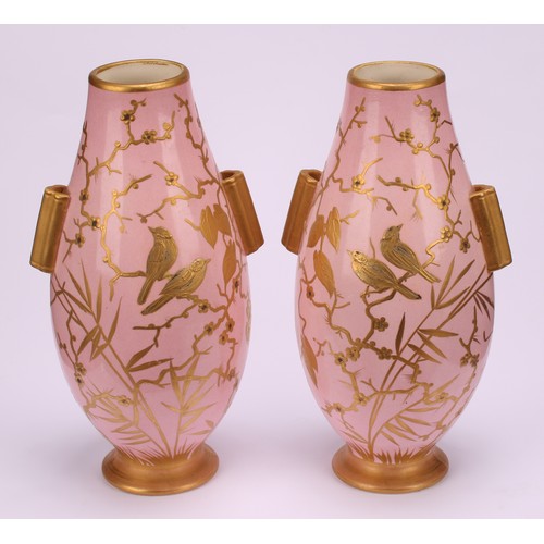 143 - A pair of Aesthetic Movement Franz Anton Mehlem ovoid vases, raised gilt decorated in the Japonisme ... 