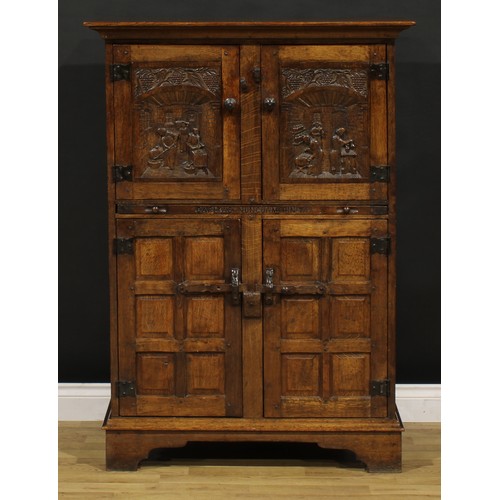 1540 - A oak wine cupboard or drinks cabinet, probably Rupert or Nigel Griffiths Monastic Woodcraft, possib... 