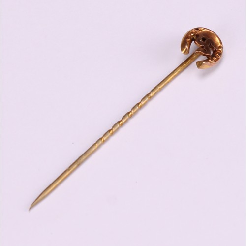 970 - Stick Pins - a 9ct gold flowerhead stick pin, illusion set with a single stone; a 9ct Three Legs of ... 