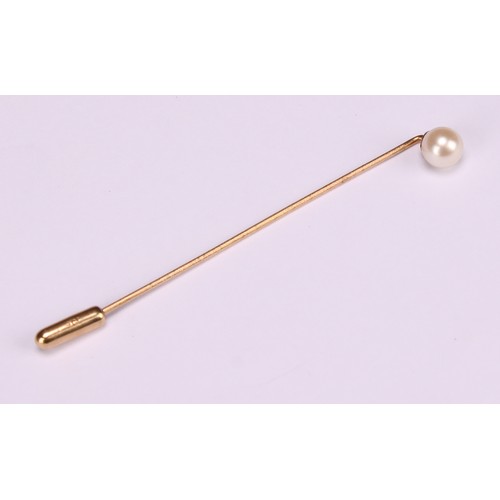 970 - Stick Pins - a 9ct gold flowerhead stick pin, illusion set with a single stone; a 9ct Three Legs of ... 