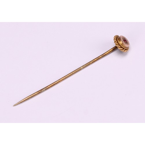 970 - Stick Pins - a 9ct gold flowerhead stick pin, illusion set with a single stone; a 9ct Three Legs of ... 