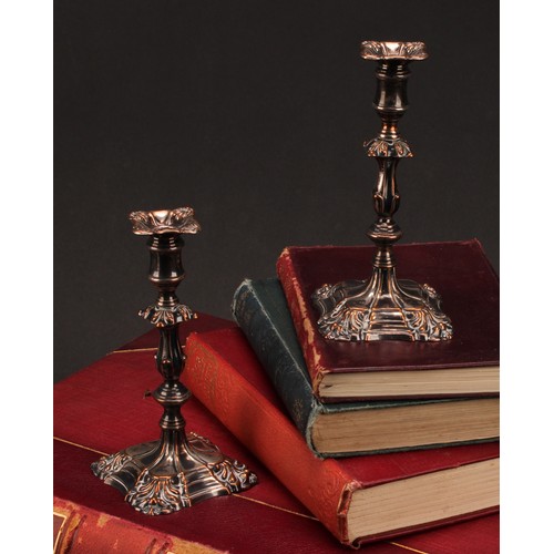 555 - A pair of William IV Old Sheffield Plate tapersticks, detachable nozzles, knopped pillars, fluted ss... 