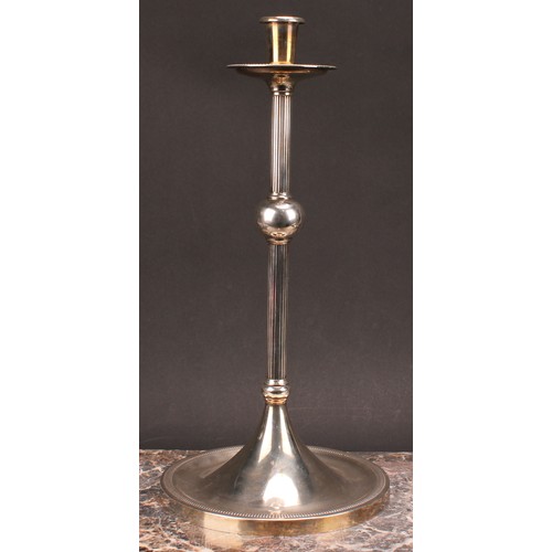 576 - Interior Design - a pair of large E.P.N.S candlesticks, of Christopher Dresser influence, broad drip... 