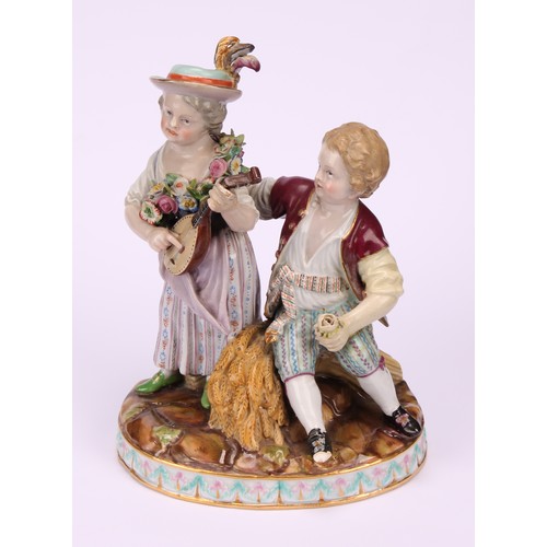 140 - A Meissen porcelain figure group, Allegory of Autumn, modelled as a girl and boy in 18th century cos... 