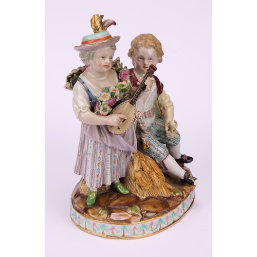 140 - A Meissen porcelain figure group, Allegory of Autumn, modelled as a girl and boy in 18th century cos... 