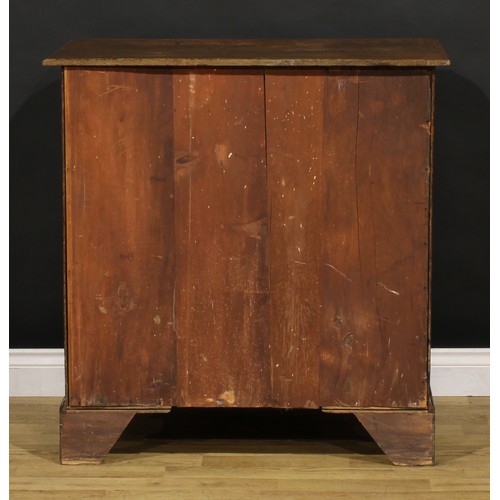 1192 - A George III oak chest, rectangular top with canted foreangles, above two short and three long gradu... 