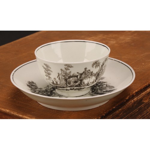 87 - A Worcester tea bowl and saucer, after Robert Hancock, printed in monochrome with L’ Amour, the sauc... 