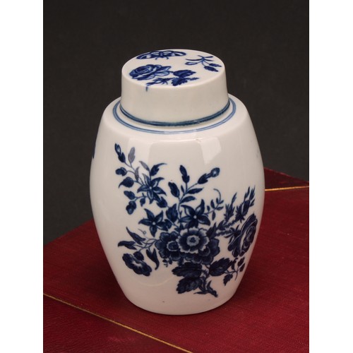 91 - A Worcester Three Flowers pattern ovoid tea canister and cover, decorated in underglaze blue with fl... 