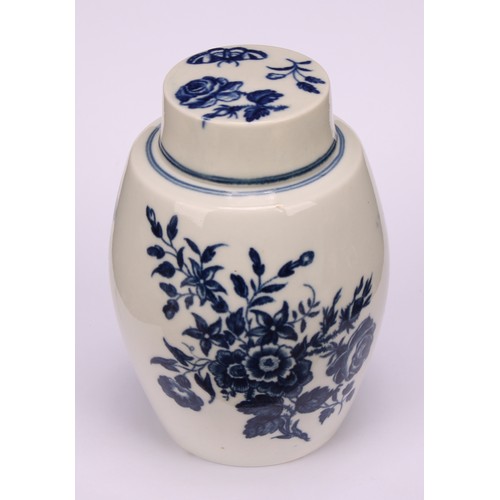 91 - A Worcester Three Flowers pattern ovoid tea canister and cover, decorated in underglaze blue with fl... 