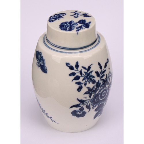 91 - A Worcester Three Flowers pattern ovoid tea canister and cover, decorated in underglaze blue with fl... 