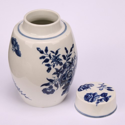 91 - A Worcester Three Flowers pattern ovoid tea canister and cover, decorated in underglaze blue with fl... 