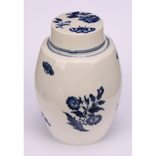 91 - A Worcester Three Flowers pattern ovoid tea canister and cover, decorated in underglaze blue with fl... 