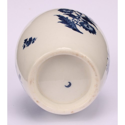 91 - A Worcester Three Flowers pattern ovoid tea canister and cover, decorated in underglaze blue with fl... 