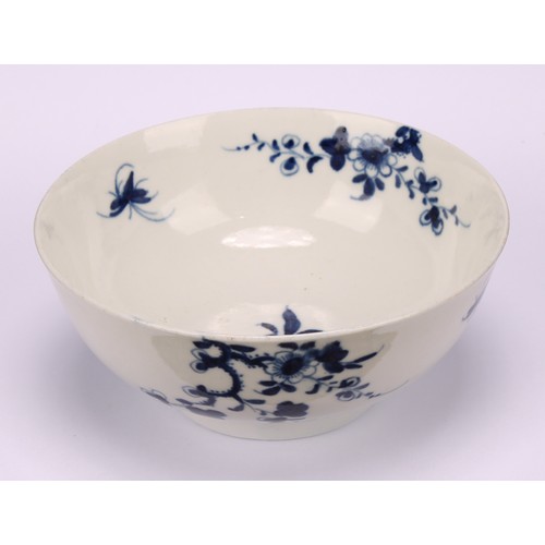 85 - A Worcester Prunus Root pattern circular bowl, printed in underglaze blue with scrolling prunus bran... 