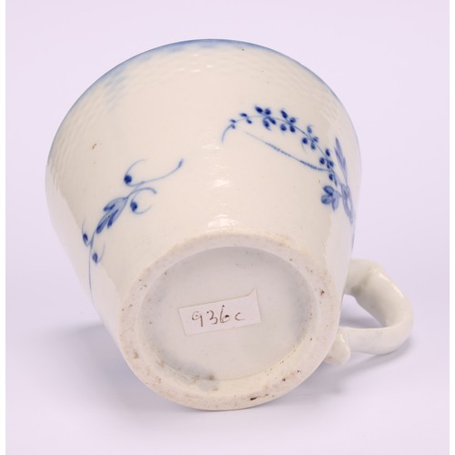 29 - A Caughley Chantilly Sprig pattern coffee cup, in underglaze blue, kick handle, 6cm high; a Caughley... 