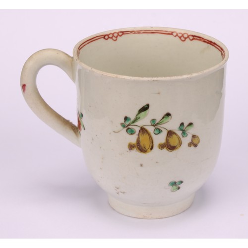 49 - A Liverpool coffee cup, decorated in polychrome with cabbage rose and scattered sprays, the interior... 