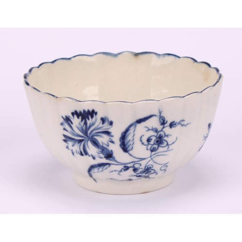 80 - A Worcester Gilliflower pattern fluted tea bowl, 7cm diameter, crescent mark, c.1770; a similar teac... 