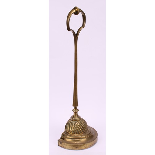 1183 - A 19th century brass door stop or porter, posted handle, fluted demi-lune base, 36cm high