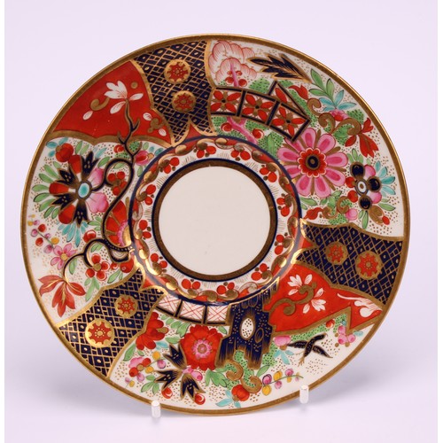 52 - A Flight Barr and Barr Worcester Imari style saucer, decorated in polychrome and gilt with fence, fl... 