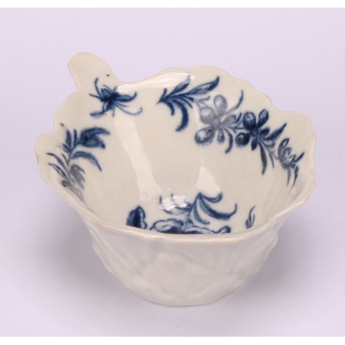 79 - A Worcester geranium moulded butter boat, decorated in underglaze blue with the Formal Rose pattern,... 