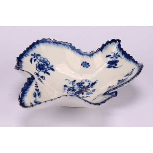 47 - A Bow leaf shaped pickle dish, decorated in underglaze blue with floral sprays, blue painted rim, 10... 