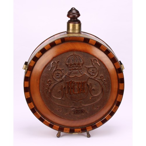 1184 - A 19th century Continental fruitwood circular flask, banded borders, carved in relief with a crowned... 