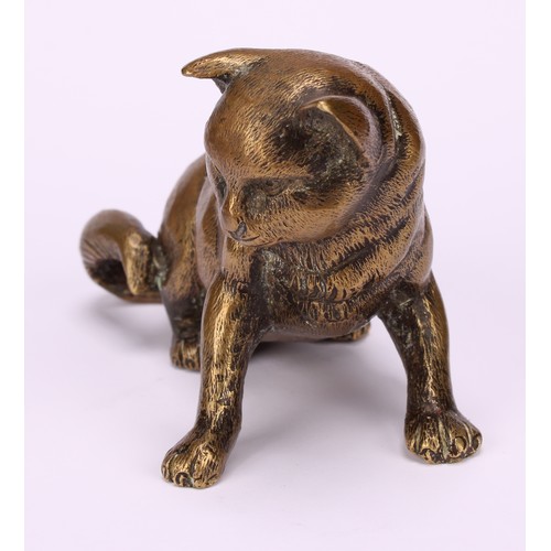 1185 - An Austrian cabinet bronze, of a playful cat, 9cm long, c.1900