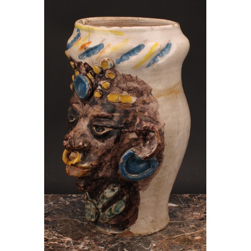 15 - A Sicilian maiolica anthropomorphic vase, probably Caltagirone, of a woman of African descent, 39cm ... 