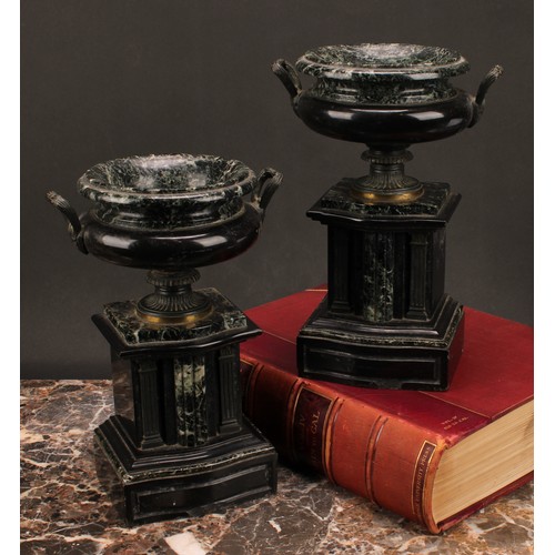 1288 - A pair of 19th century French brass footed verde antico and black marble urns, fluted handles, suppo... 