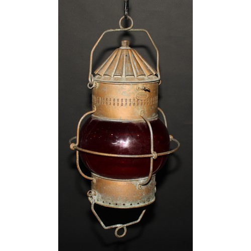 1177 - A Davy & Co London Ltd. ship's cabin oil lantern, the hinged conical cover enclosing a later lamp so... 