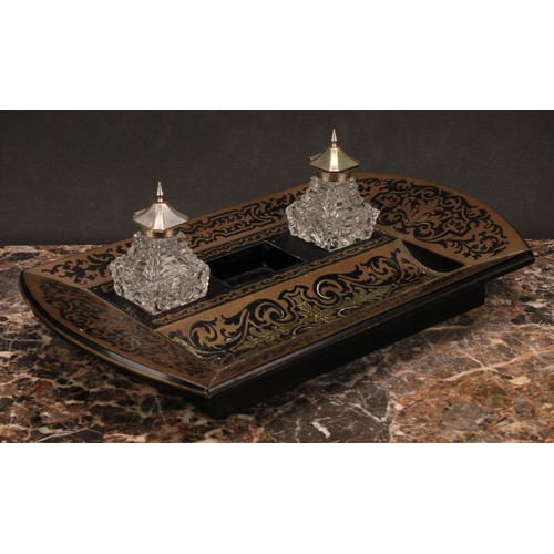 1921 - An Edwardian Boulle and ebonised brass marquetry inkstand, shaped rectangular body, the central well... 